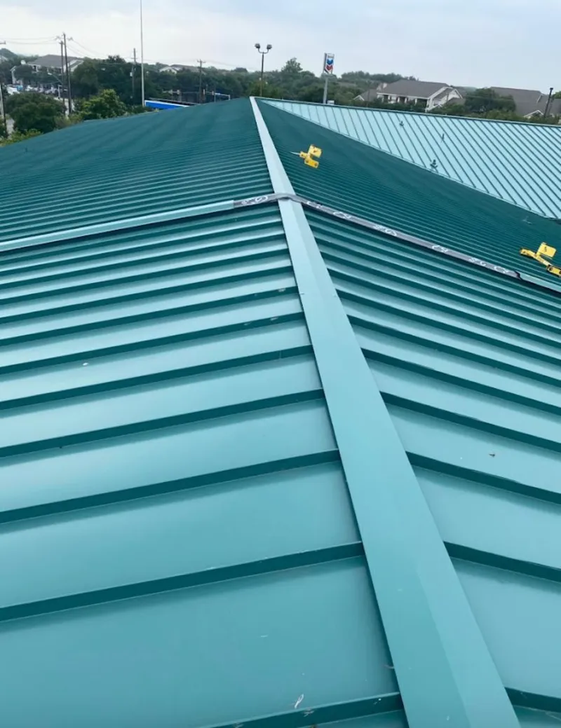 Green commercial metal roof ridge and valley for Metal Roof Repair in Selma